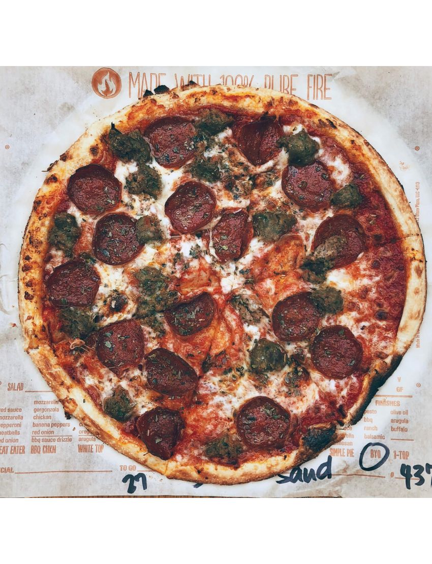 Pizza peel with wooden handle