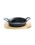 Cast iron pan with 2 handles, Ø 18 cm, and wooden base